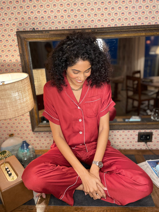 Solid short sleeve pyjama set with contrast piping by AltSleep. Indulge in luxury sleepwear with our signature collection by AltSleep. From stylish pyjamas to elegant kaftans, made-to-order our brand offers sleep solutions exclusively made for you. We believe in conscious fashion, provide customisations beyond standard sizes of XS to XL using superior fabrics for the best quality night wear.