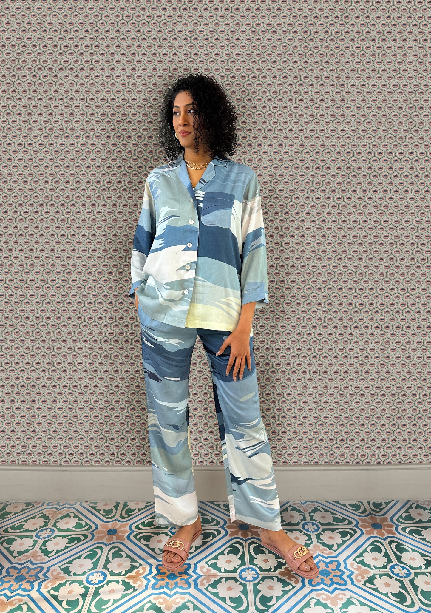 Printed, cropped sleeve button down pyjama set by AltSleep. Indulge in luxury sleepwear with our signature collection by AltSleep. From stylish pyjamas to elegant kaftans, made-to-order our brand offers sleep solutions exclusively made for you. We believe in conscious fashion, provide customisations beyond standard sizes of XS to XL using superior fabrics for the best quality night wear.