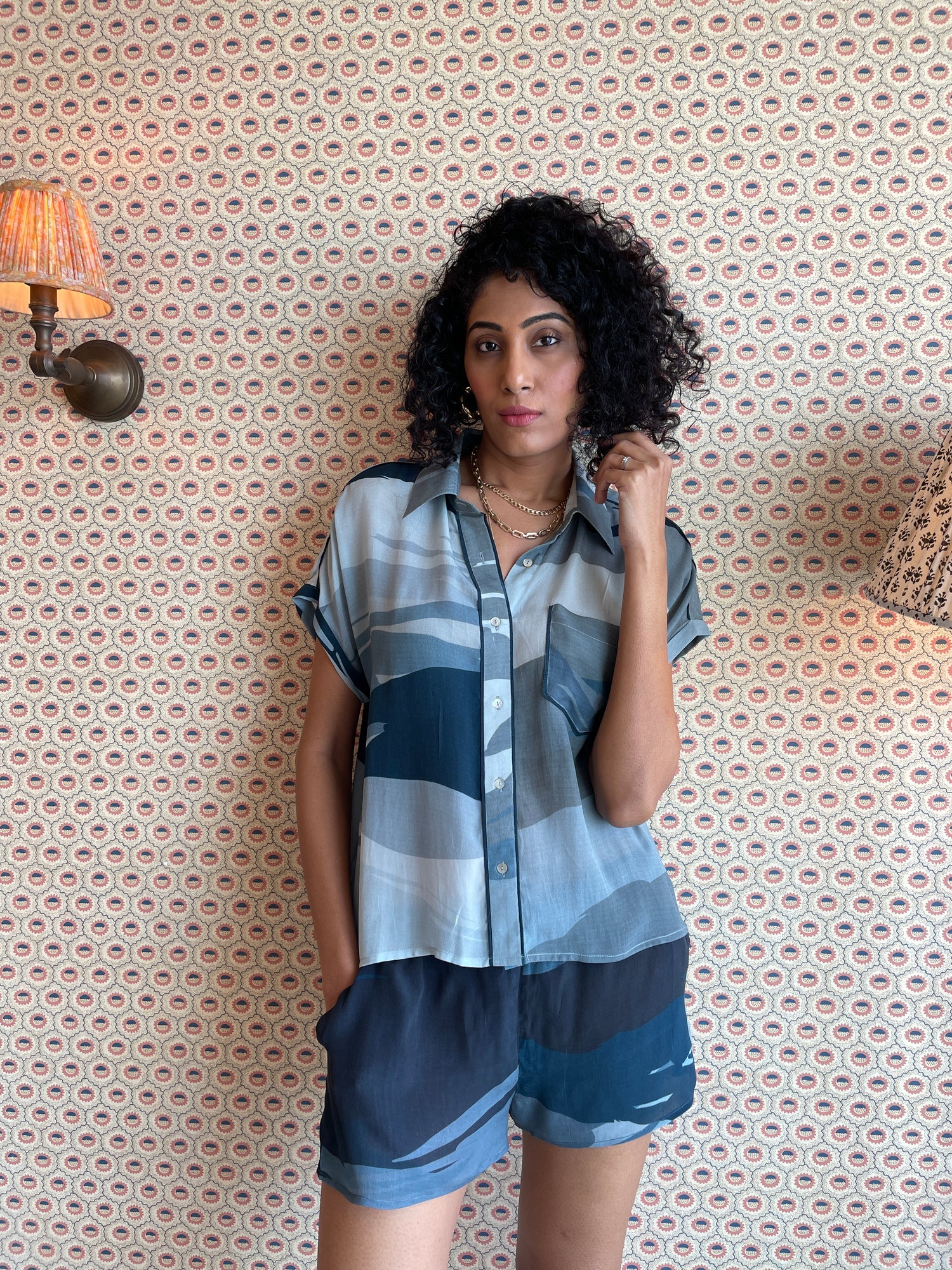 Printed Short sleeve button down shorts set by AllThingsSleep. Indulge in luxury sleepwear with our signature collection. From stylish pyjamas to elegant kaftans, made-to-order our brand offers sleep solutions exclusively made for you. We believe in conscious fashion, provide customisations beyond standard sizes of XS to XL using superior fabrics for the best quality night wear.