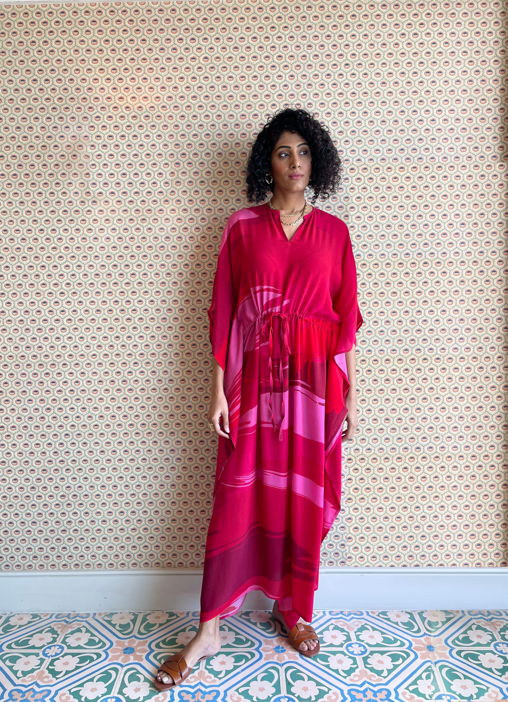 Crimson printed long kaftan in silk and modal by AllThingsSleep. One Size. Indulge in luxury sleepwear with our signature collection. From stylish pyjamas to elegant kaftans, made-to-order our brand offers sleep solutions exclusively made for you. We believe in conscious fashion, provide customisations beyond standard sizes using superior fabrics for the best quality night wear.