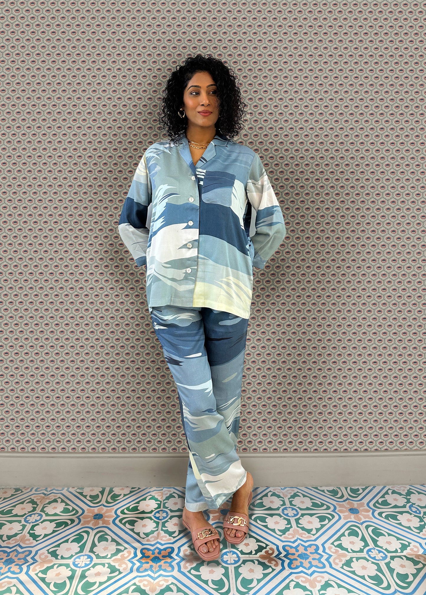 Printed, cropped sleeve button down pyjama set by AltSleep. Indulge in luxury sleepwear with our signature collection by AltSleep. From stylish pyjamas to elegant kaftans, made-to-order our brand offers sleep solutions exclusively made for you. We believe in conscious fashion, provide customisations beyond standard sizes of XS to XL using superior fabrics for the best quality night wear.