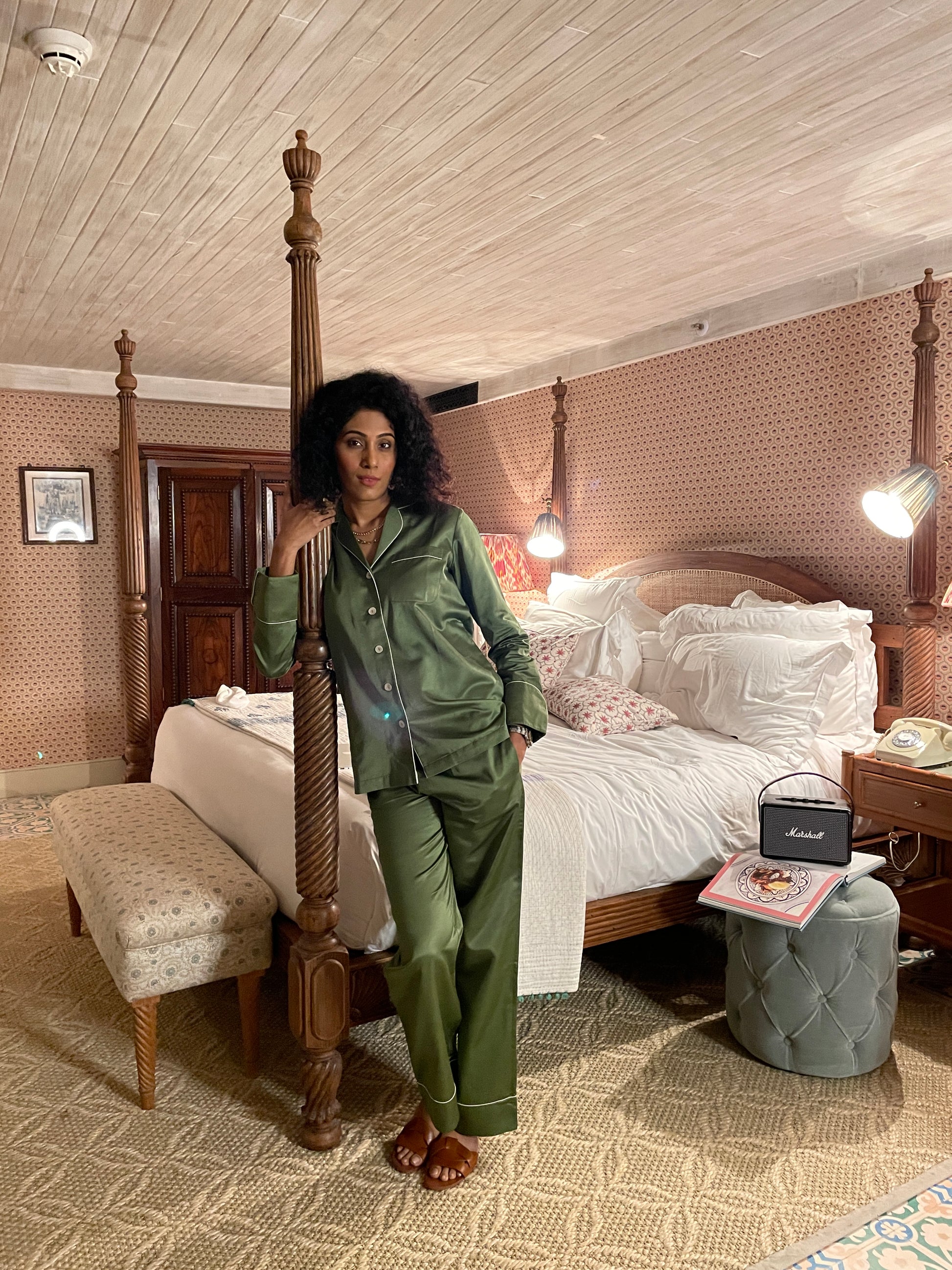 Button down long sleeve pyjama set in rainforest green with contrast piping. Indulge in luxury sleepwear with our signature collection by AltSleep. From stylish pyjamas to elegant kaftans, made-to-order our brand offers sleep solutions exclusively made for you. We believe in conscious fashion, provide customisations beyond standard sizes of XS to XL using superior fabrics for the best quality night wear.